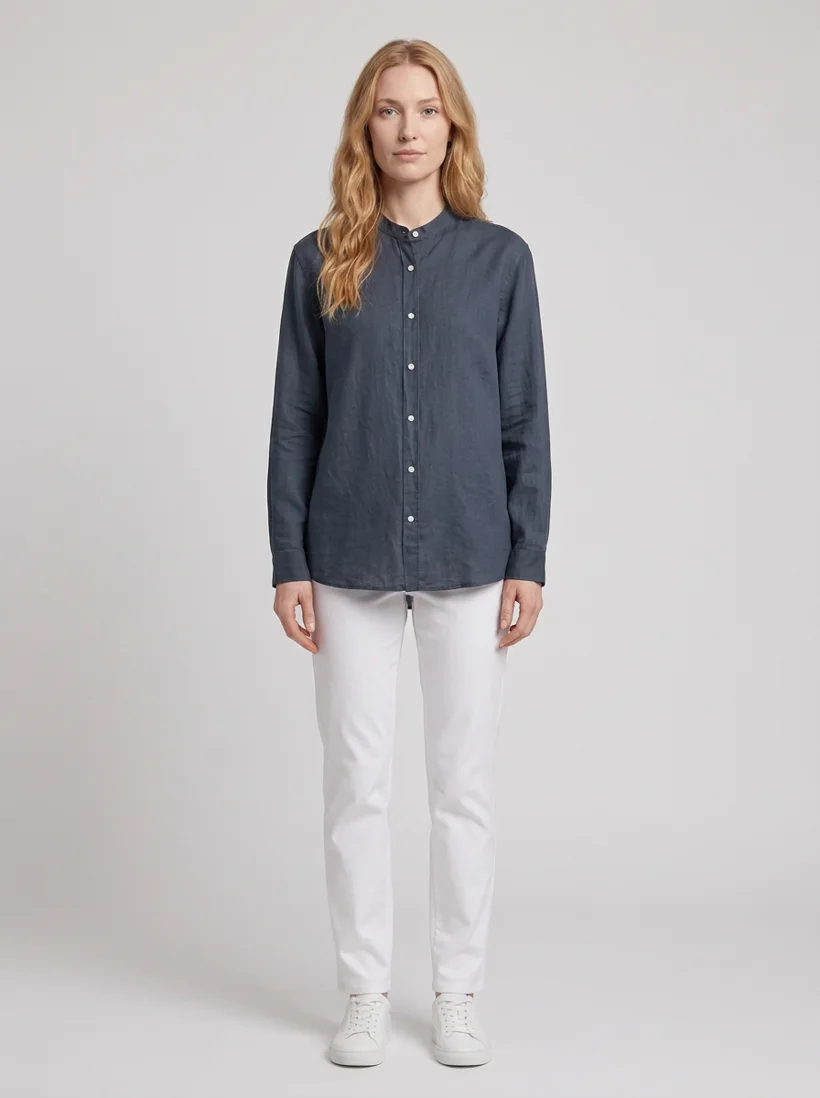 Studio product-page shot of the linen shirt on a model, full body, light grey seamless, generated with Gemini Flash 2
