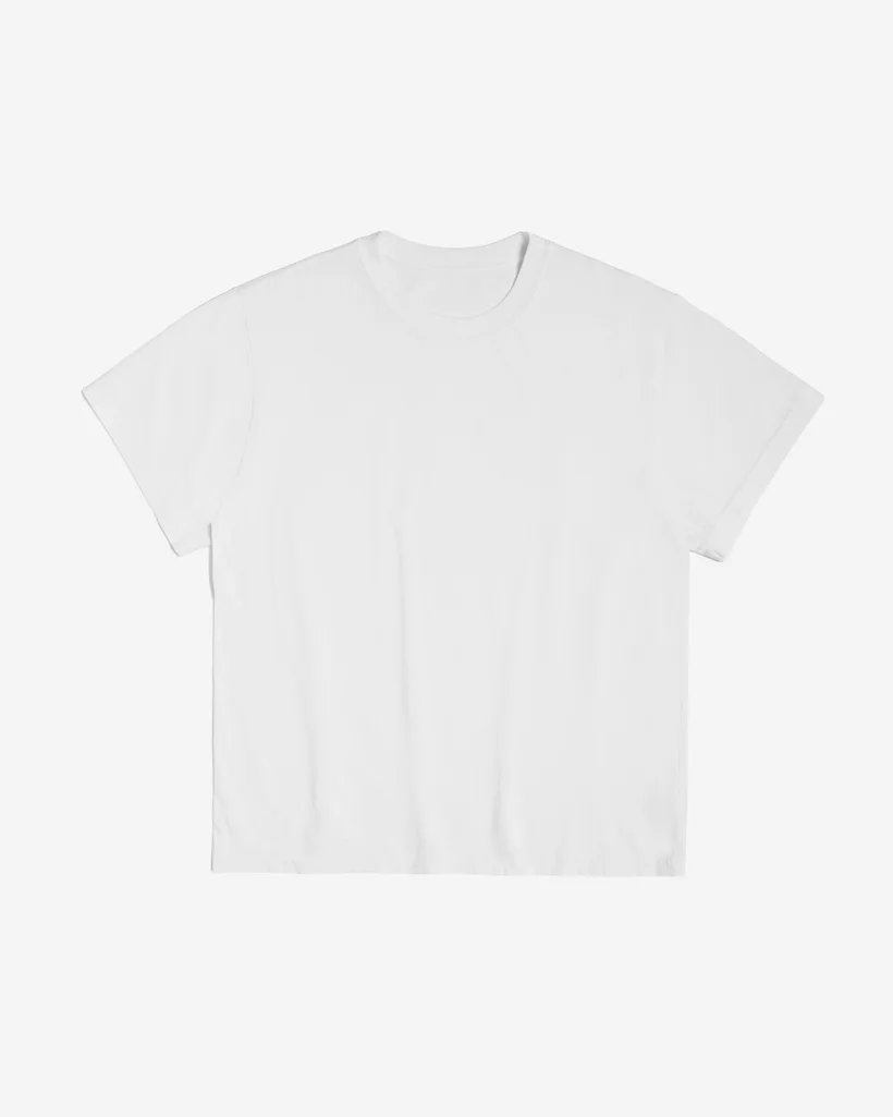 Product photo of a white heavyweight crew-neck tee on a plain background, the reference uploaded to Uwear