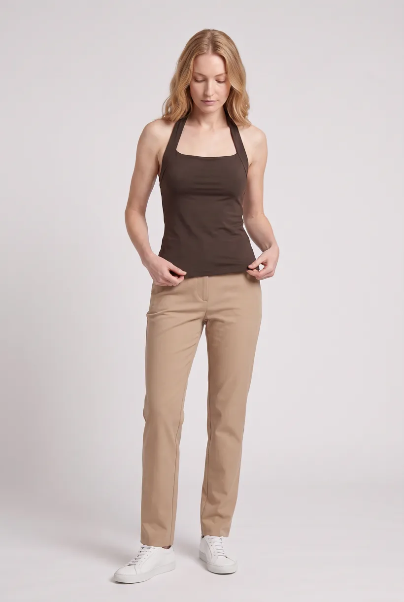 Model wearing a chocolate halter top with a bow at the neck, full-body front on the Pure White studio, generated with nano-banana-pro through the Product page set template