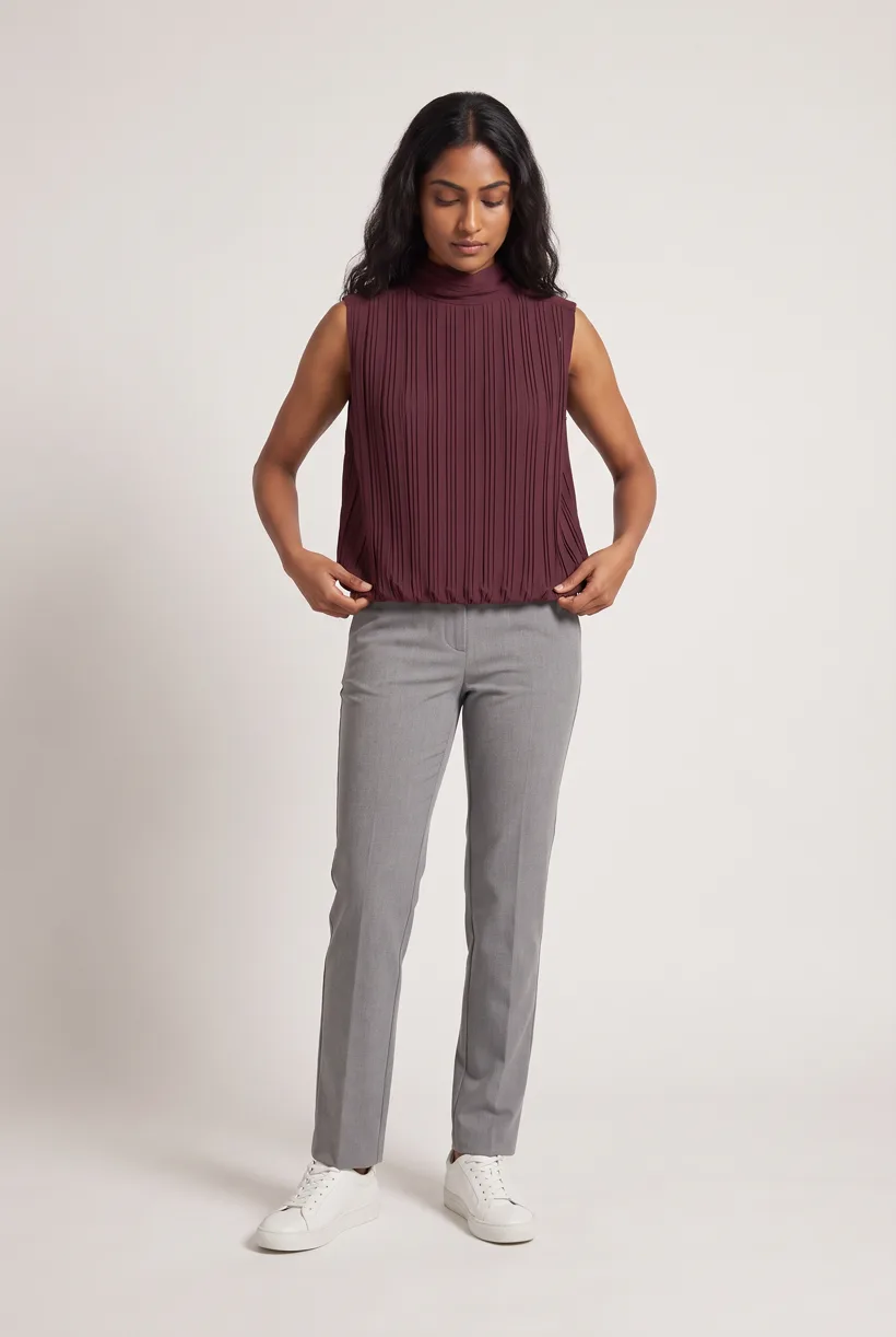 Model wearing a pleated sleeveless high-neck blouse, full-body front on the Pure White studio, generated with nano-banana-pro through the Product page set template