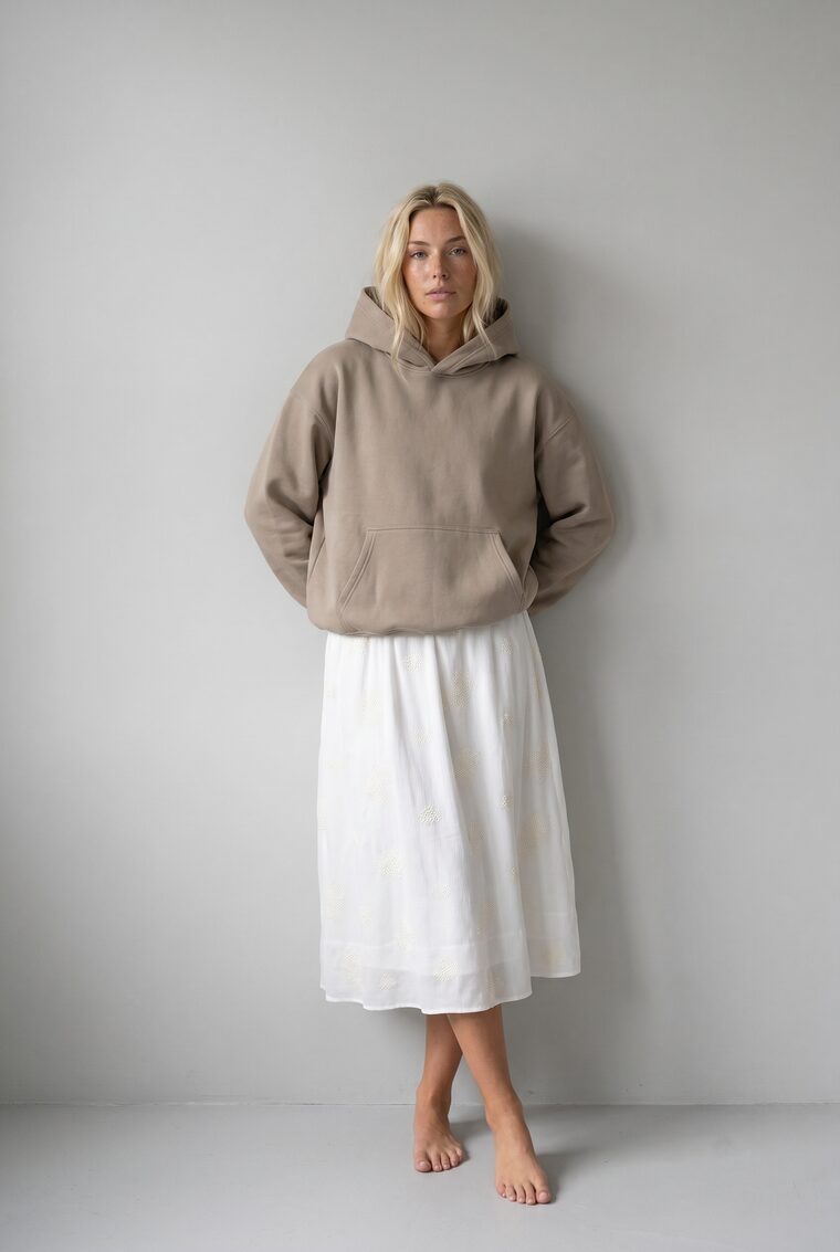 Generated on-model look: taupe hoodie with a skirt